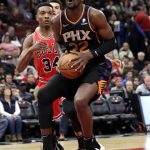 Phoenix Suns center Deandre Ayton (22) looks to the basket against the Chicago Bulls during the first half of an NBA basketball game Wednesday, Nov. 21, 2018, in Chicago. (AP Photo/Nam Y. Huh)