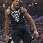 Milwaukee Bucks' Giannis Antetokounmpo reacts after he dunked against the Phoenix Suns during the first half of an NBA basketball game Friday, Nov. 23, 2018, in Milwaukee. (AP Photo/Jeffrey Phelps)