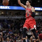 Chicago Bulls guard Zach LaVine dunks against the Phoenix Suns during the second half of an NBA basketball game Wednesday, Nov. 21, 2018, in Chicago. The Bulls won 124-116. (AP Photo/Nam Y. Huh)