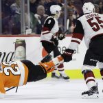Philadelphia Flyers' Claude Giroux (28) gets tangled up with Arizona Coyotes' Jason Demers (55) during the third period of an NHL hockey game, Thursday, Nov. 8, 2018, in Philadelphia. Philadelphia won 5-4 in overtime. (AP Photo/Matt Slocum)