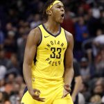 Indiana Pacers center Myles Turner (33) reacts to his three pointer during the second half of an NBA basketball game against the Phoenix Suns, Tuesday, Nov. 27, 2018, in Phoenix. The Pacers won 109-104. (AP Photo/Matt York)