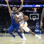Phoenix Suns' Trevor Ariza (3) drives to the basket as Philadelphia 76ers' Furkan Korkmaz (30) defends in the first half of an NBA basketball game, Monday, Nov. 19, 2018, in Philadelphia. (AP Photo/Michael Perez)