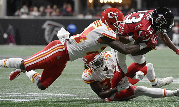 Kansas City Chiefs defensive back David Amerson (24) tackles Atlanta Falcons wide receiver Reggie D...