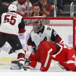 Detroit Red Wings center Michael Rasmussen (27) scores on Arizona Coyotes goaltender Darcy Kuemper (35) in the first period of an NHL hockey game Tuesday, Nov. 13, 2018, in Detroit. (AP Photo/Paul Sancya)