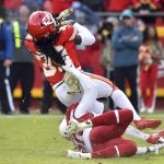 Kansas City Chiefs return specialist Tremon Smith (39) is brought down by his hair by Arizona Cardinals linebacker Deone Bucannon (20), incurring a horse collaring penalty, during the second half of an NFL football game in Kansas City, Mo., Sunday, Nov. 11, 2018. (AP Photo/Ed Zurga)