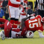 Kansas City Chiefs quarterback Patrick Mahomes (15) is sacked by Arizona Cardinals defensive end Chandler Jones (55) during the first half of an NFL football game in Kansas City, Mo., Sunday, Nov. 11, 2018. (AP Photo/Charlie Riedel)