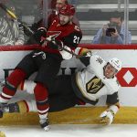 Arizona Coyotes defenseman Oliver Ekman-Larsson (23) sends Vegas Golden Knights defenseman Brayden McNabb (3) to the ice during the first period of an NHL hockey game Wednesday, Nov. 21, 2018, in Glendale, Ariz. (AP Photo/Ross D. Franklin)