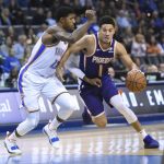 Phoenix Suns guard Devin Booker (1) drives past Oklahoma City Thunder forward Paul George (13) in the first half of an NBA basketball game in Oklahoma City, Monday, Nov. 12, 2018. (AP Photo/Kyle Phillips)