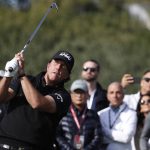 Phil Mickelson hits off the second fairway during a golf match against Tiger Woods at Shadow Creek golf course, Friday, Nov. 23, 2018, in Las Vegas. (AP Photo/John Locher)