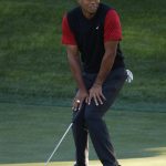 Tiger Woods reacts after missing a putt on the 14th green during a golf match against Phil Mickelson at Shadow Creek golf course, Friday, Nov. 23, 2018, in Las Vegas. (AP Photo/John Locher)