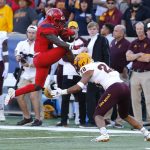 Arizona running back J.J. Taylor tries to leap over Arizona State defensive back Demonte King (28) in the second half during an NCAA college football game, Saturday, Nov. 24, 2018, in Tucson, Ariz. (AP Photo/Rick Scuteri)