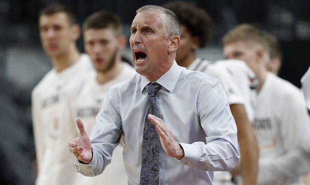 Arizona State head coach Bobby Hurley yells toward the court during the second half of an NCAA coll...