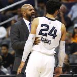 Memphis Grizzlies head coach J.B. Bickerstaff talks to Dillon Brooks (24) in the second half during an NBA basketball game against the Phoenix Suns, Sunday, Nov. 4, 2018, in Phoenix. The Suns defeated the Grizzlies 102-100. (AP Photo/Rick Scuteri)