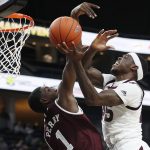 Arizona State's Zylan Cheatham (45) attempts a shot over Mississippi State's Reggie Perry (1) during the first half of a NCAA college basketball game, Monday, Nov. 19, 2018, in Las Vegas. (AP Photo/John Locher)