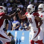 Arizona Cardinals wide receiver Larry Fitzgerald (11) celebrates his touchdown reception with teammates during the first half of an NFL football game Sunday, Nov. 25, 2018, in Carson, Calif. (AP Photo/Jae C. Hong )