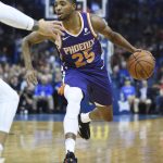 Phoenix Suns forward Mikal Bridges (25) pushes down the court in the first half of an NBA basketball game against the Oklahoma Thunder in Oklahoma City, Monday, Nov. 12, 2018. (AP Photo/Kyle Phillips)