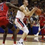 Gonzaga forward Filip Petrusev (3) drops the ball under the basket during the first half of an NCAA college basketball game against Arizona at the Maui Invitational, Tuesday, Nov. 20, 2018, in Lahaina, Hawaii. (AP Photo/Marco Garcia)