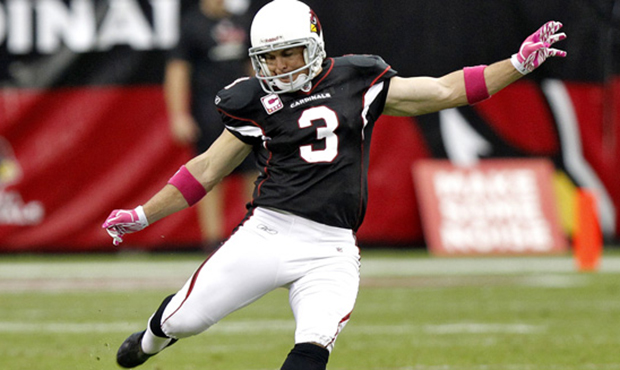 Arizona Cardinals kicker Jay Feely (3) kicks off during the second half of an NFL football game aga...