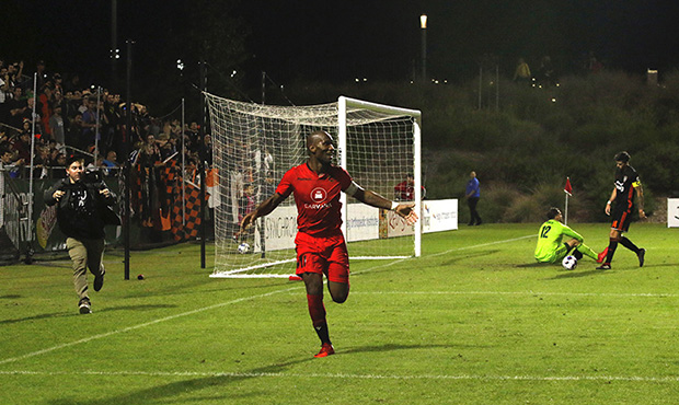 Didier Drogba celebrates his goal, running toward the corner flag Saturday night in Phoenix Rising ...