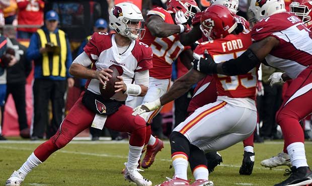 Arizona Cardinals quarterback Josh Rosen (3) looks for a receiver during the first half of an NFL f...