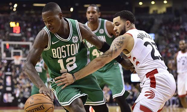 Boston Celtics guard Terry Rozier (12) moves past Toronto Raptors guard Fred VanVleet (23) during s...