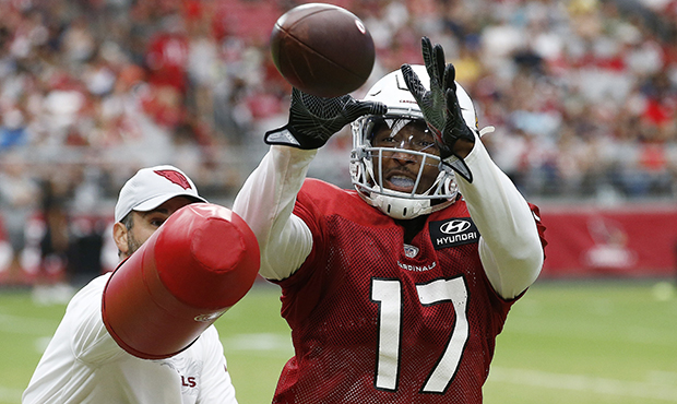 Arizona Cardinals wide receiver Jalen Tolliver makes a catch during an NFL football practice Saturd...