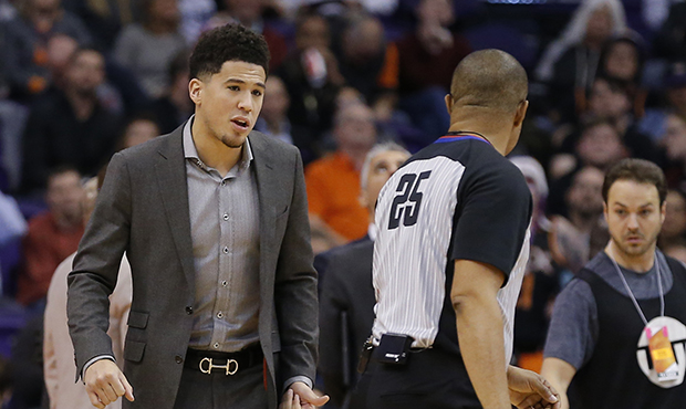 Phoenix Suns guard Devin Booker (1) in the second half during an NBA basketball game against the Da...