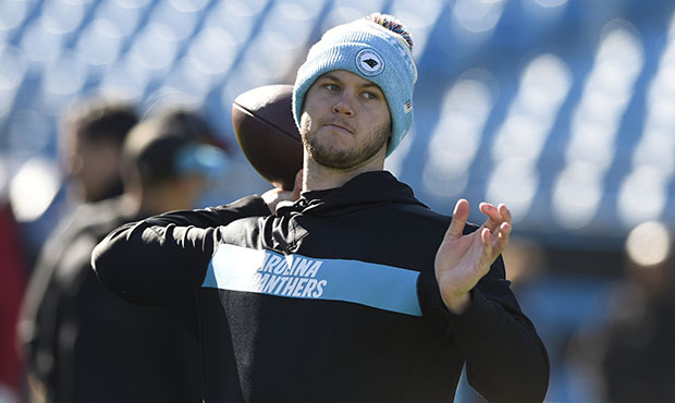 Carolina Panthers' Kyle Allen warms up before an NFL football game against the Atlanta Falcons in C...