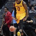 Arizona State guard Luguentz Dort celebrates after scoring during the first half of the team's NCAA college basketball game against Nevada at the Basketball Hall of Fame Classic on Friday, Dec. 7, 2018, in Los Angeles. (AP Photo/Mark J. Terrill)
