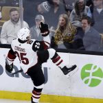 Arizona Coyotes center Nick Cousins (25) pumps his fist as he celebrates towards Boston Bruins fans after his goal during the first period of an NHL hockey game in Boston, Tuesday, Dec. 11, 2018. (AP Photo/Charles Krupa)