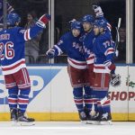 New York Rangers right wing Pavel Buchnevich (89) celebrates after scoring a goal with his teammates during the first period of an NHL hockey game against the Arizona Coyotes, Friday, Dec. 14, 2018, at Madison Square Garden in New York. (AP Photo/Mary Altaffer)