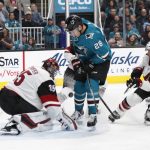 Arizona Coyotes' Darcy Kuemper (35) makes a save against the San Jose Sharks' Timo Meier (28) in the first period of an NHL hockey game in San Jose, Calif., Sunday, Dec. 23, 2018. (AP Photo/Josie Lepe)