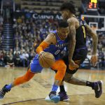 Oklahoma City Thunder guard Russell Westbrook (0) gets fouled by Phoenix Suns forward Kelly Oubre Jr in the first half during an NBA basketball game, Friday, Dec. 28, 2018, in Phoenix. (AP Photo/Rick Scuteri)