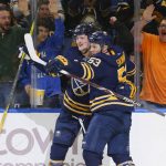 Buffalo Sabres forwards Jack Eichel (9) and Jeff Skinner (53) celebrate a goal during the first period of an NHL hockey game against the Arizona Coyotes, Thursday, Dec. 13, 2018, in Buffalo N.Y. (AP Photo/Jeffrey T. Barnes)