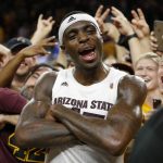 Arizona State forward Zylan Cheatham (45) celebrates with the fans after Arizona State defeated Kansas 80-76 during an NCAA college basketball game Saturday, Dec. 22, 2018, in Tempe, Ariz. (AP Photo/Rick Scuteri)