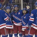 New York Rangers center Mika Zibanejad, center celebrates after scoring a goal during the second period of an NHL hockey game against the Arizona Coyotes, Friday, Dec. 14, 2018, at Madison Square Garden in New York. (AP Photo/Mary Altaffer)