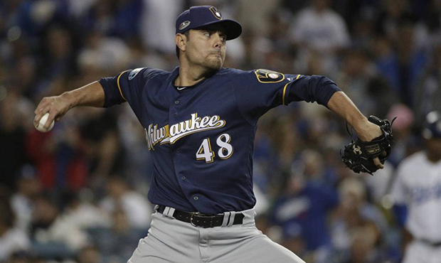 Milwaukee Brewers' Joakim Soria throws during the seventh inning of Game 4 of the National League C...