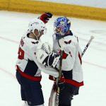 Washington Capitals goaltender Pheonix Copley, right, celebrates after the team's 4-2 win against the Arizona Coyotes with Capitals defenseman Christian Djoos, left, in an NHL hockey game Thursday, Dec. 6, 2018, in Glendale, Ariz. (AP Photo/Ross D. Franklin)