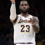 Los Angeles Lakers' LeBron James (23) gestures after scoring against the Phoenix Suns during the first half of an NBA basketball game Sunday, Dec. 2, 2018, in Los Angeles. (AP Photo/Marcio Jose Sanchez)