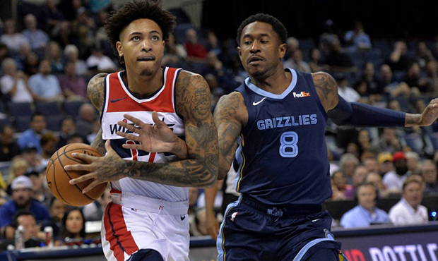 Washington Wizards forward Kelly Oubre Jr. (12) drives against Memphis Grizzlies guard MarShon Broo...