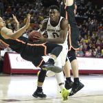 Arizona State guard Luguentz Dort (0) collides with Princeton's Jaelin Llewellyn, left, as he drives to the basket during the second half of an NCAA college basketball game, Saturday, Dec. 29, 2018, in Tempe, Ariz. (AP Photo/Ralph Freso)