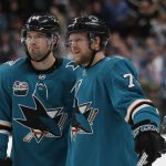 San Jose Sharks' Marc-Edouard Vlasic (44) and Tim Heed (72) celebrate goal against the Arizona Coyotes in the first period of an NHL hockey game in San Jose, Calif., Sunday, Dec. 23, 2018. (AP Photo/Josie Lepe)