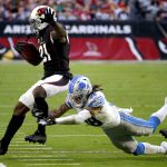 Arizona Cardinals cornerback Patrick Peterson (21) is knocked out of bounds by Detroit Lions defensive back Mike Ford (38) on a punt return during the first half of NFL football game, Sunday, Dec. 9, 2018, in Glendale, Ariz. (AP Photo/Rick Scuteri)