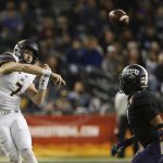 California quarterback Chase Garbers (7) throws a pass over TCU linebacker Arico Evans, right, during the first half of the Cheez-It Bowl NCAA college football game Wednesday, Dec. 26, 2018, in Phoenix. (AP Photo/Ross D. Franklin)