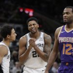San Antonio Spurs forward Rudy Gay (22) reacts after he was called for a foul against the Phoenix Suns during the first half of an NBA basketball game, Tuesday, Dec. 11, 2018, in San Antonio. (AP Photo/Eric Gay)