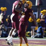 Arizona State wide receiver Geordon Porter, right, celebrates after wide receiver Kyle Williams, left, scored a touchdown against Fresno State during the first half of the Las Vegas Bowl NCAA college football game, Saturday, Dec. 15, 2018, in Las Vegas. (AP Photo/John Locher)