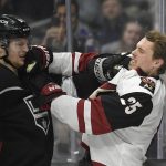 Los Angeles Kings left wing Austin Wagner, left, and Arizona Coyotes center Nick Cousins tangle during the second period of an NHL hockey game Thursday, Dec. 27, 2018, in Los Angeles. (AP Photo/Mark J. Terrill)