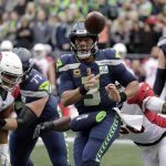 Seattle Seahawks quarterback Russell Wilson (3) passes against the Arizona Cardinals during the first half of an NFL football game, Sunday, Dec. 30, 2018, in Seattle. (AP Photo/Ted S. Warren)