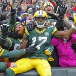 Green Bay Packers wide receiver Davante Adams (17) celebrates after scoring a touchdown against the Arizona Cardinals during the first half of an NFL football game Sunday, Dec. 2, 2018, in Green Bay, Wis. (AP Photo/Mike Roemer)