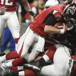 Atlanta Falcons quarterback Matt Ryan (2) falls into the end zone for a touchdown -ac- during the first half of an NFL football game, Sunday, Dec. 16, 2018, in Atlanta. (AP Photo/John Amis)